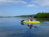 Kayaking over to breakfast. The sea is seldom so mirror-smooth