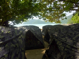 So lovely to step out of a tent onto a tropical beach... along with a hundred other people... and the view ain't so great in the back row