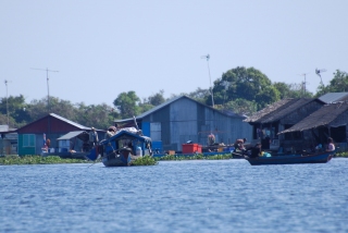 Tonle Sap, the enormous lake in the middle of Cambodia, with entire floating villages and commerce done with boats of all sizes