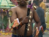 And to dispel the squeaky-modern image, we watched a Hindu procession of startlingly pierced devotees